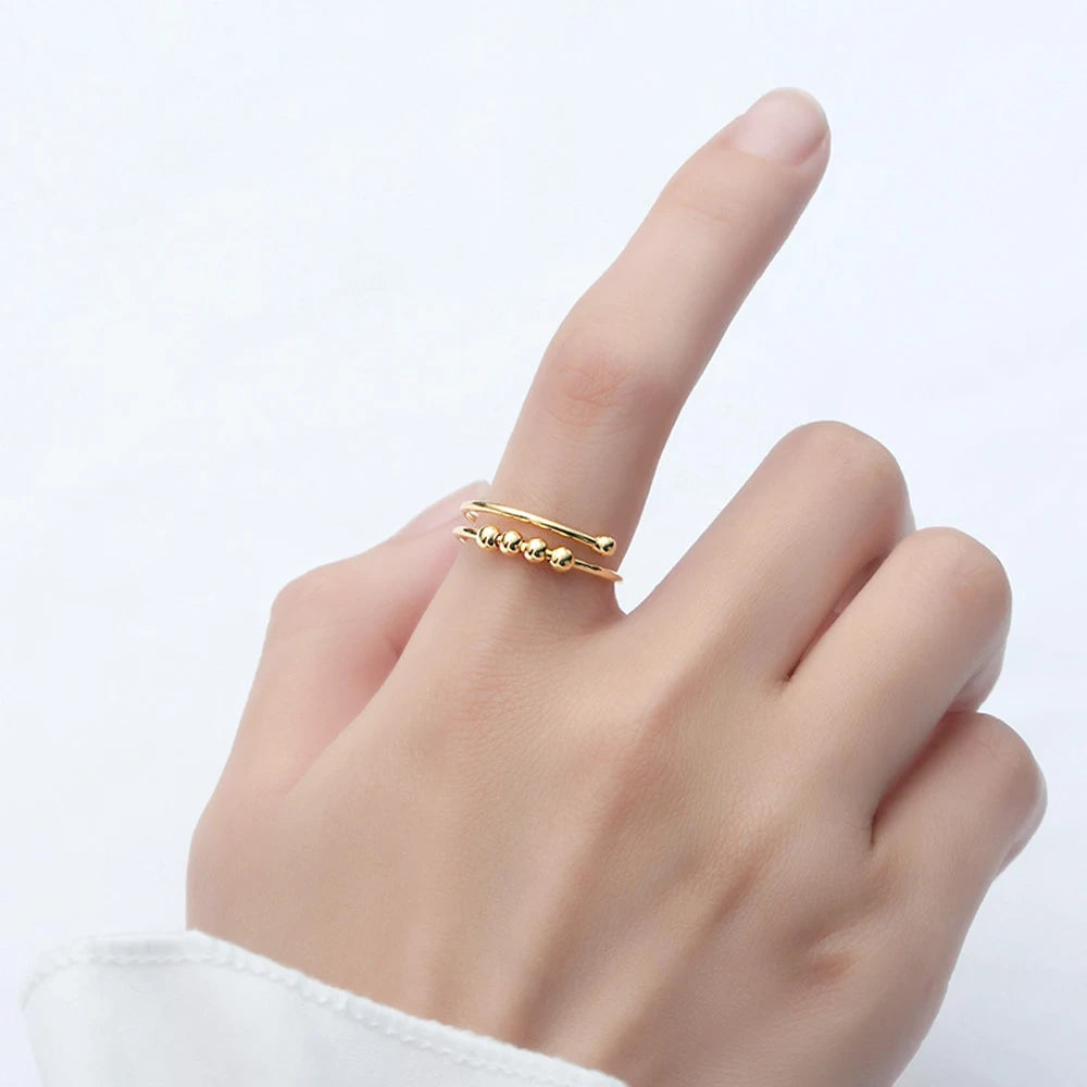 Luxurious Gold-Plated Bead Ring for Focus and Anxiety Reduction on Jewelry Wearing Model